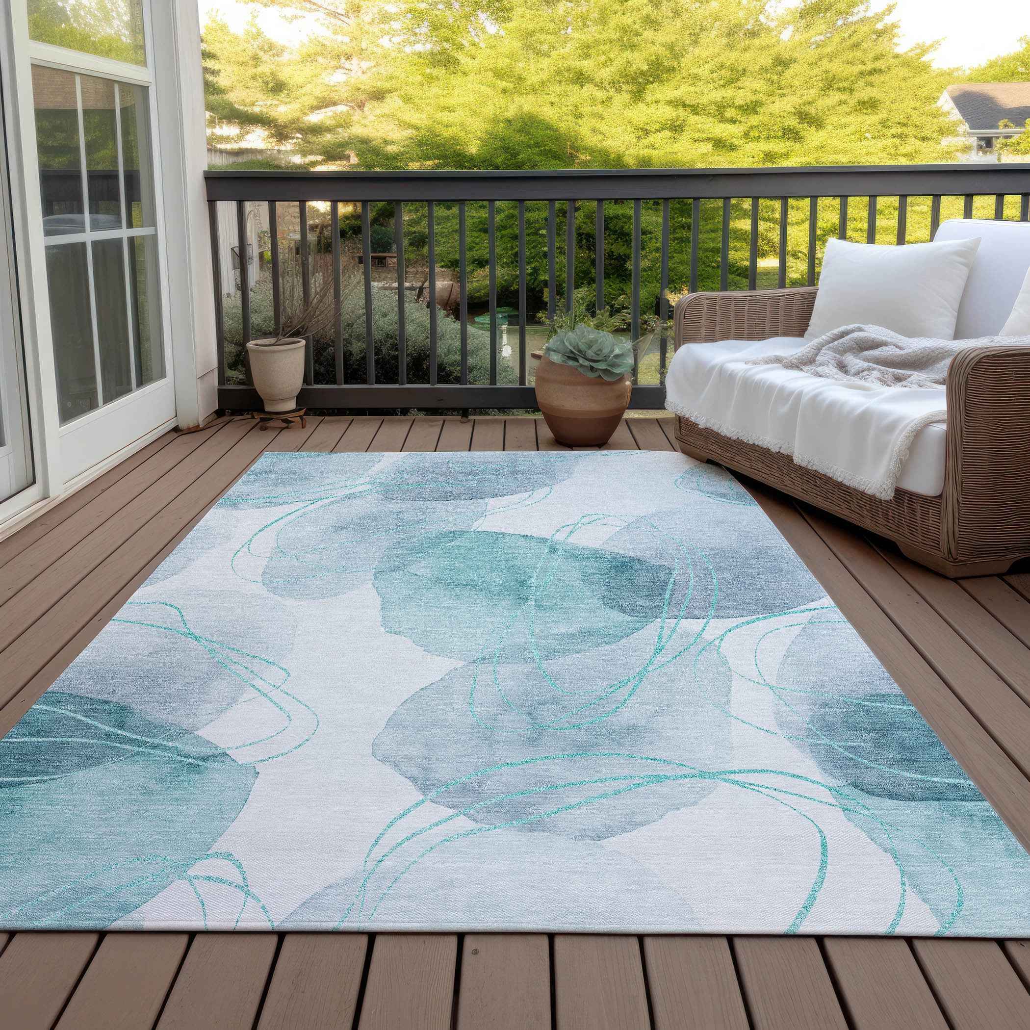 8' X 10' Teal and Ivory Abstract Washable Non Skid Indoor Outdoor Area Rug