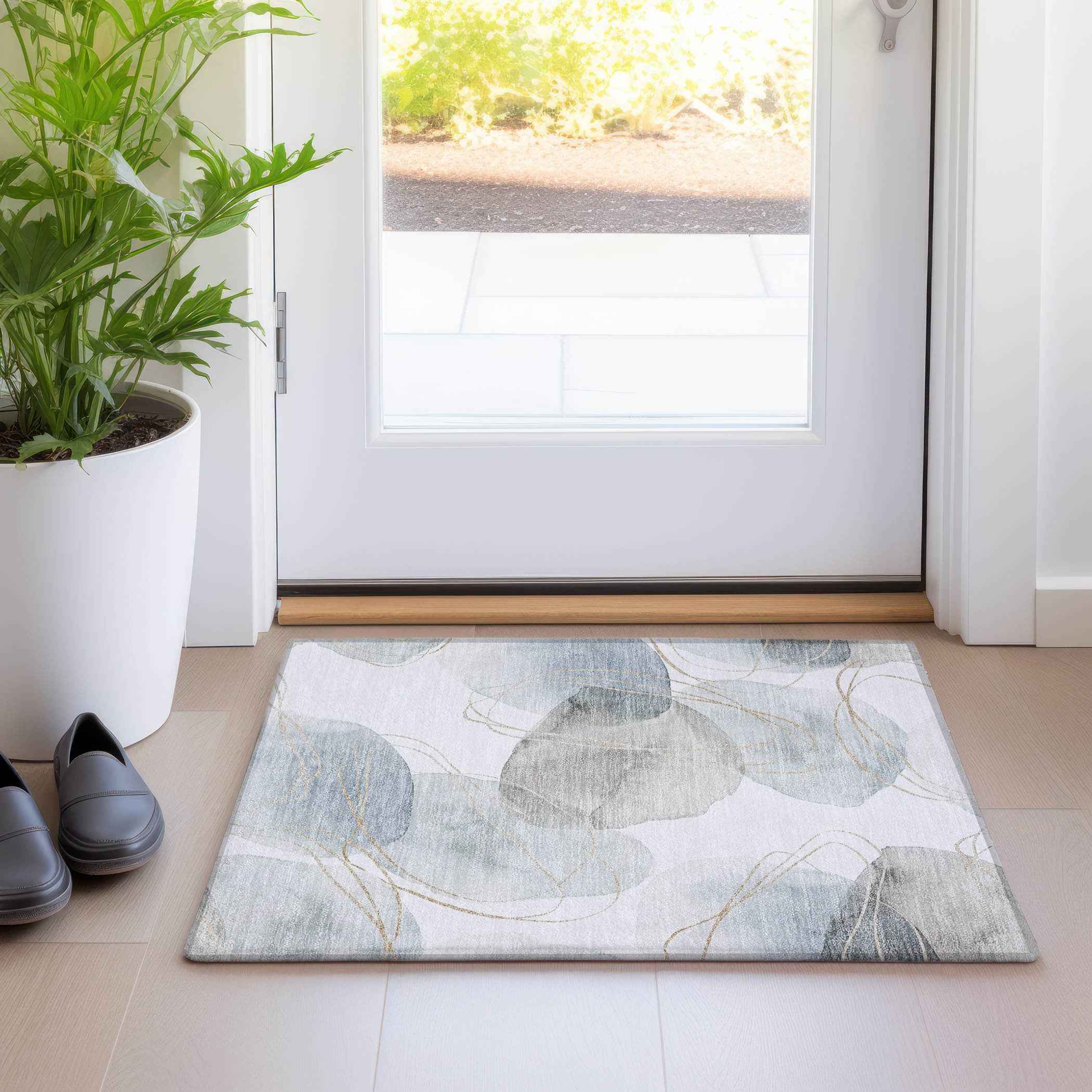 2' X 3' Ivory Blue and Gray Abstract Washable Non Skid Indoor Outdoor Area Rug