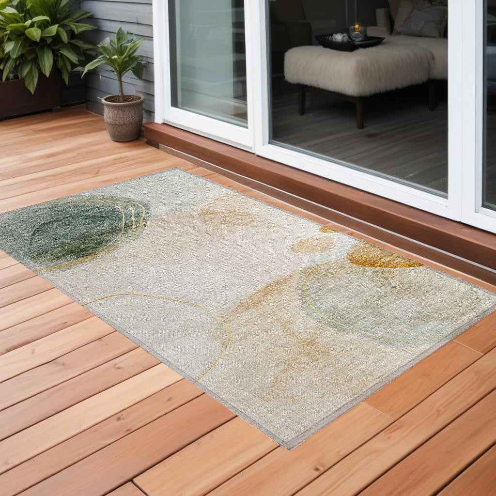 2' X 3' Beige and Green Abstract Washable Non Skid Indoor Outdoor Area Rug