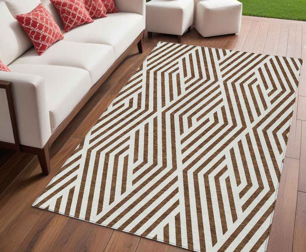 5' X 8' Brown and White Geometric Washable Non Skid Indoor Outdoor Area Rug