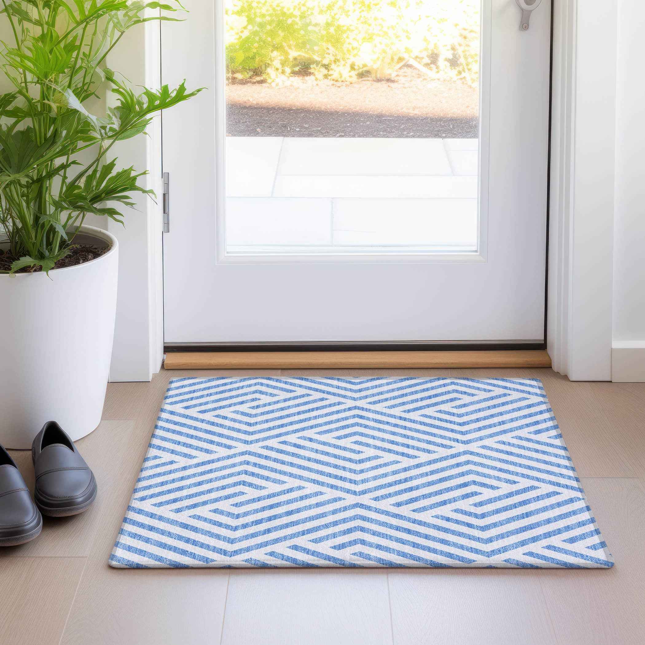 2' X 3' Blue and Ivory Geometric Washable Non Skid Indoor Outdoor Area Rug