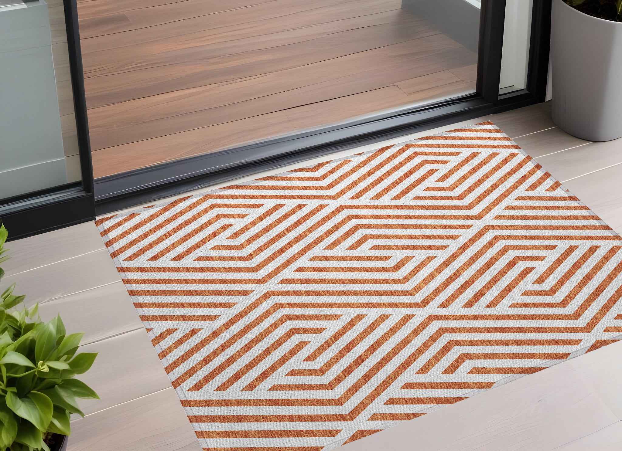 3' X 5' Orange And White Geometric Washable Indoor Outdoor Area Rug