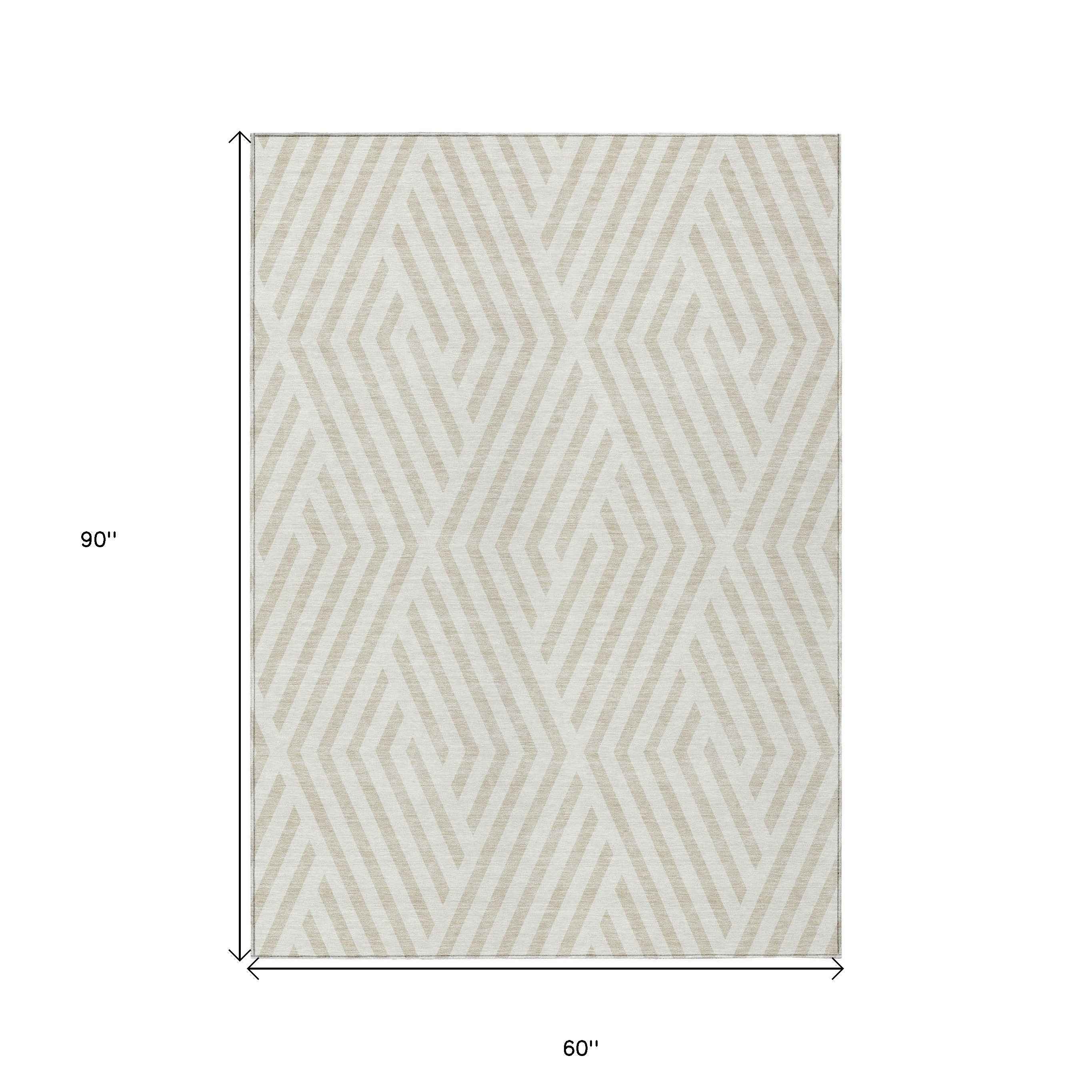5' X 8' Beige and Ivory Geometric Washable Non Skid Indoor Outdoor Area Rug