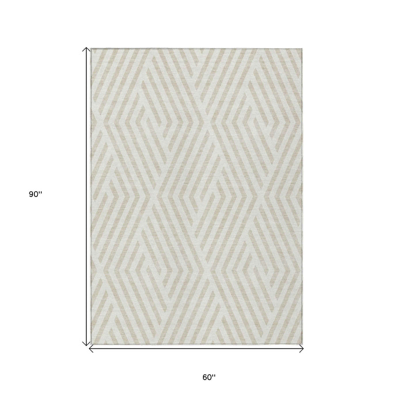 5' X 8' Beige and Ivory Geometric Washable Non Skid Indoor Outdoor Area Rug
