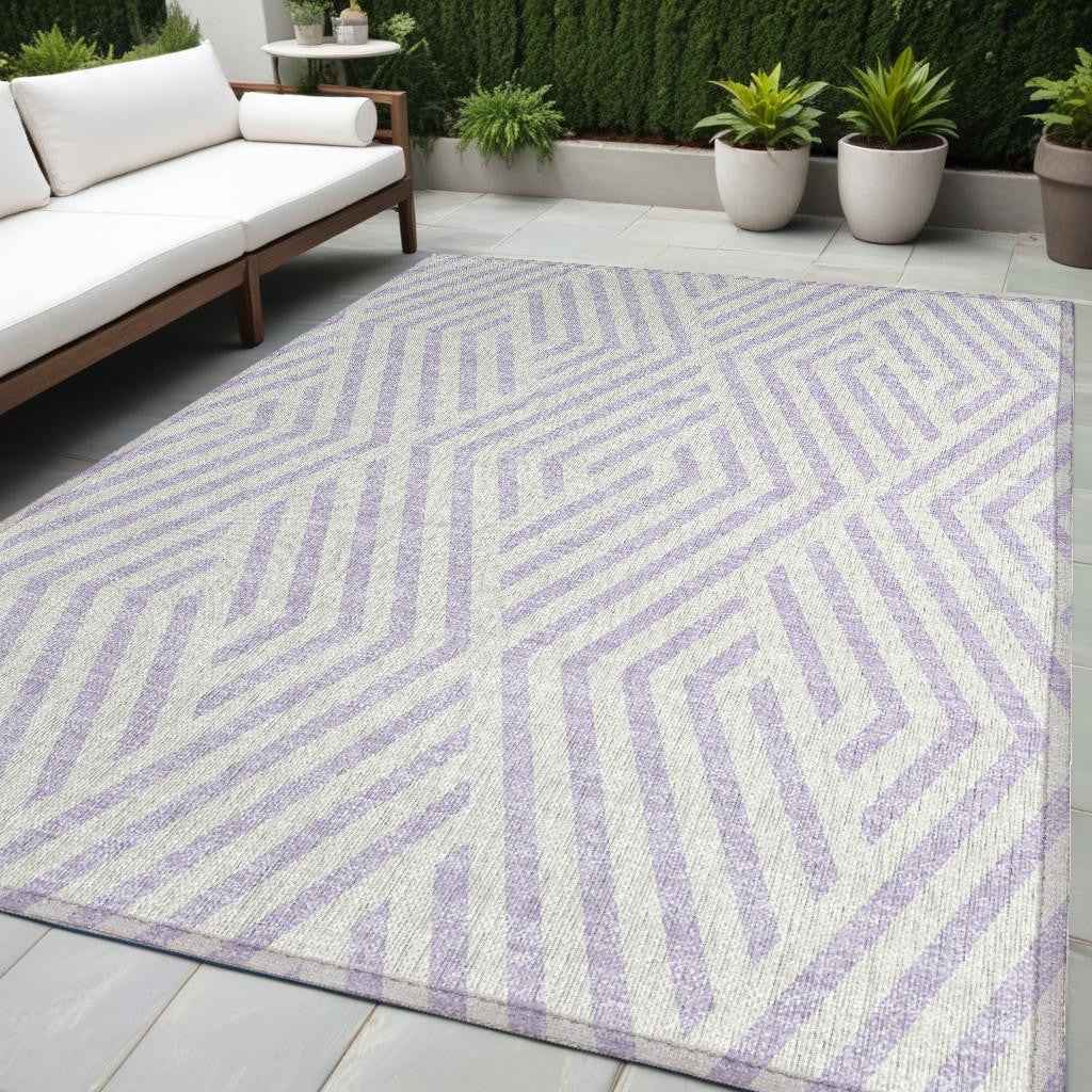 5' X 8' Lavender and Ivory Geometric Washable Non Skid Indoor Outdoor Area Rug