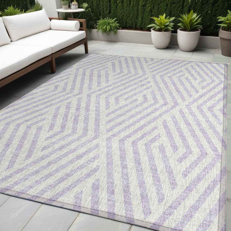 5' X 8' Lavender and Ivory Geometric Washable Non Skid Indoor Outdoor Area Rug