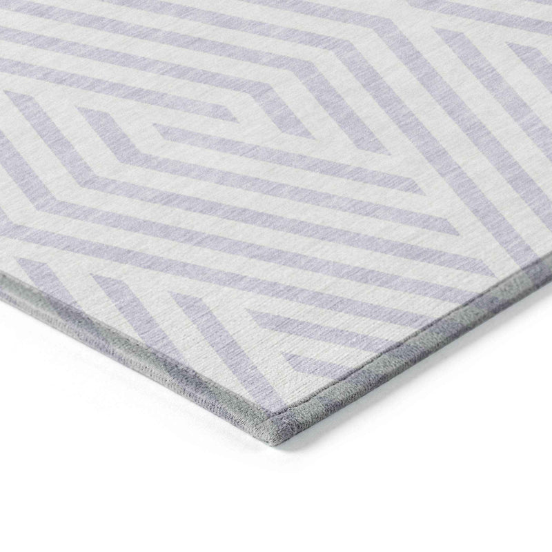 5' X 8' Lavender and Ivory Geometric Washable Non Skid Indoor Outdoor Area Rug