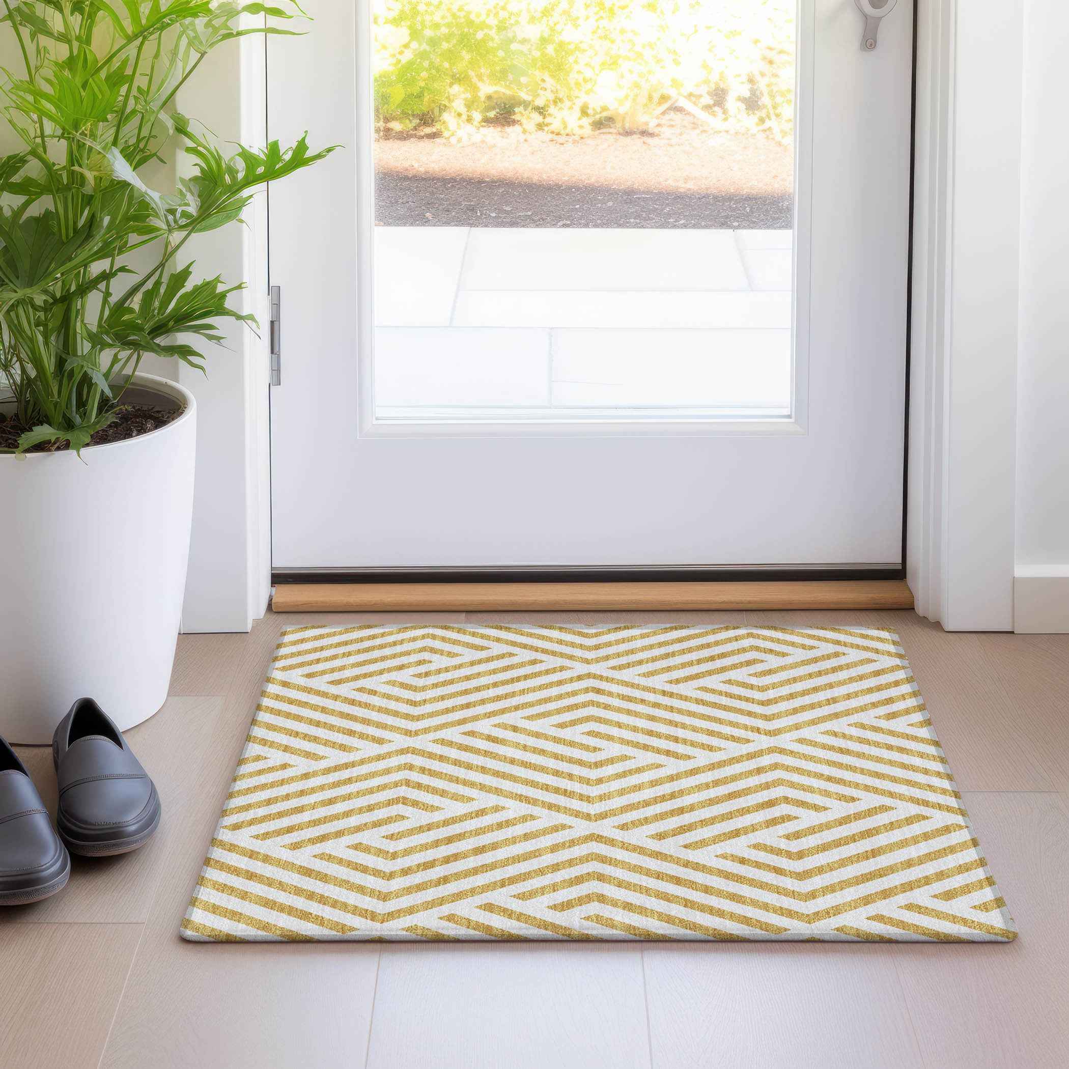 2' X 3' Gold and White Geometric Washable Non Skid Indoor Outdoor Area Rug