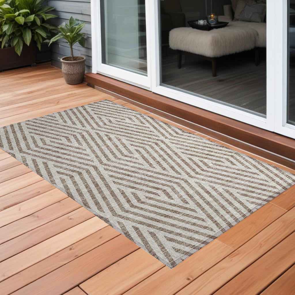 2' X 3' Taupe and Ivory Geometric Washable Non Skid Indoor Outdoor Area Rug