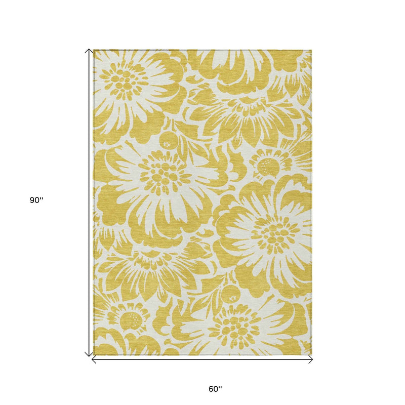 5' X 8' Gold and White Floral Washable Non Skid Indoor Outdoor Area Rug