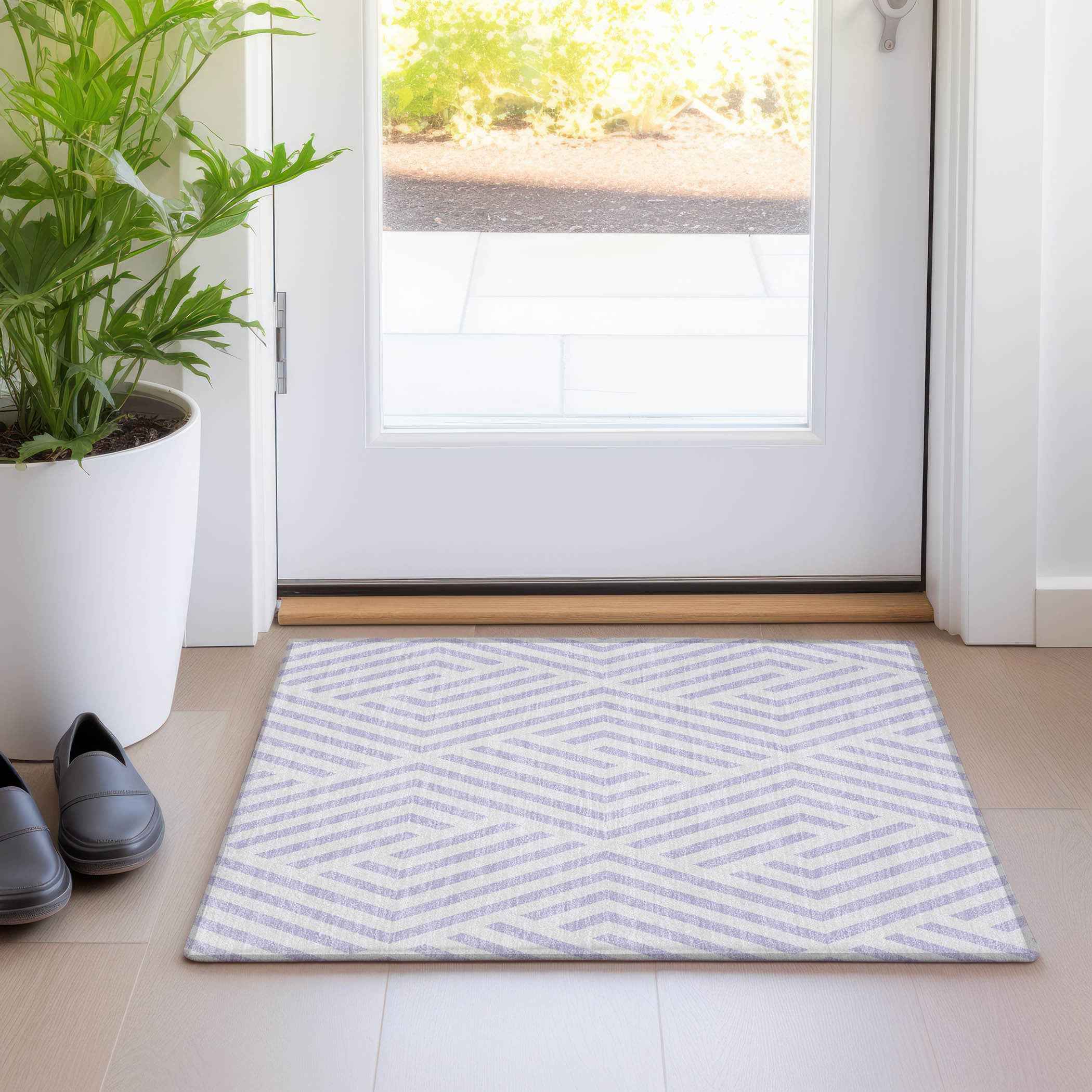 2' X 3' Lavender and Ivory Geometric Washable Non Skid Indoor Outdoor Area Rug