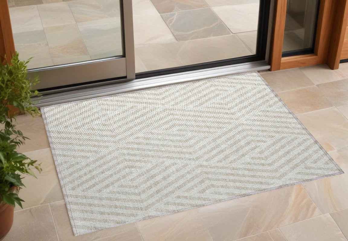 2' X 3' Beige and Ivory Geometric Washable Non Skid Indoor Outdoor Area Rug