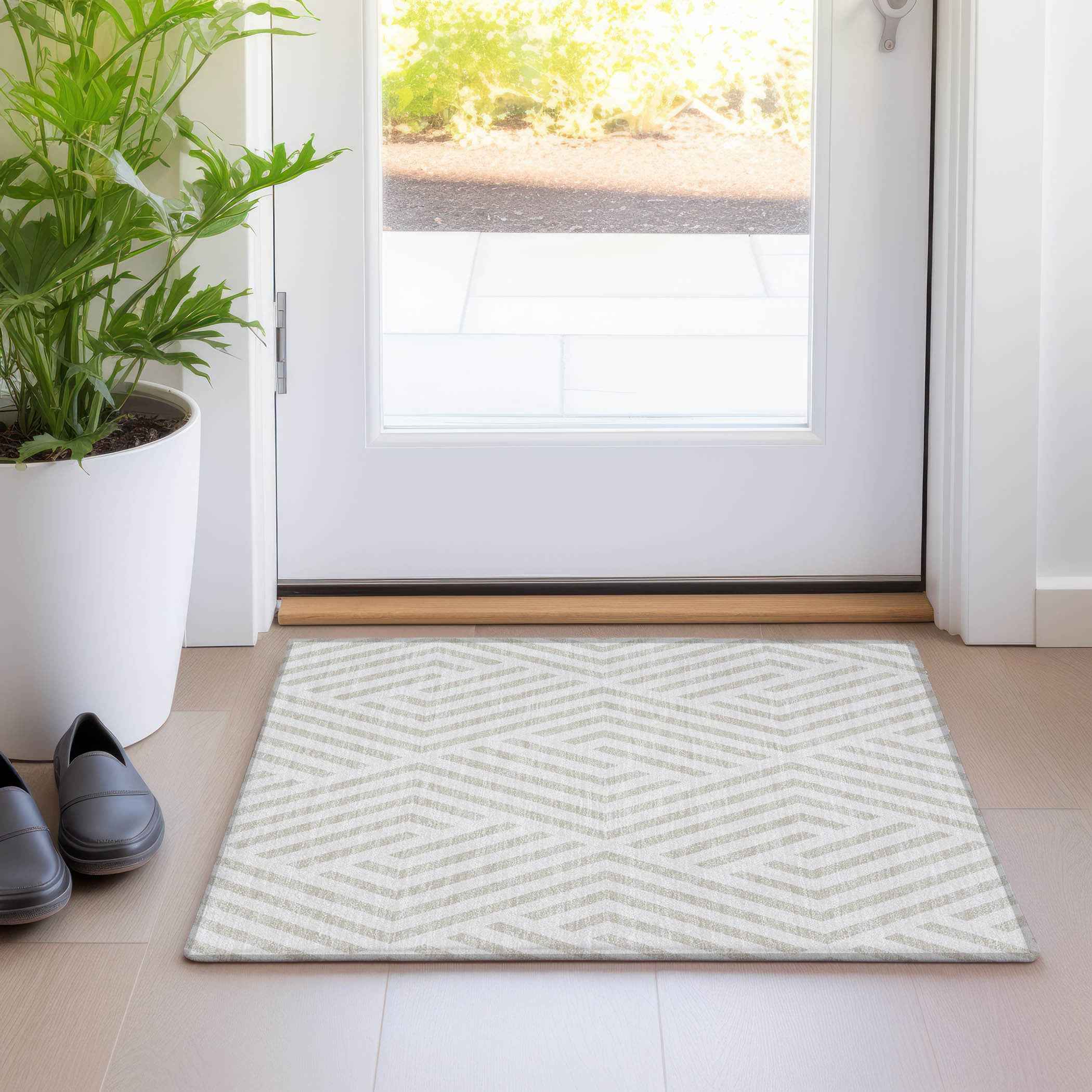 2' X 3' Beige and Ivory Geometric Washable Non Skid Indoor Outdoor Area Rug