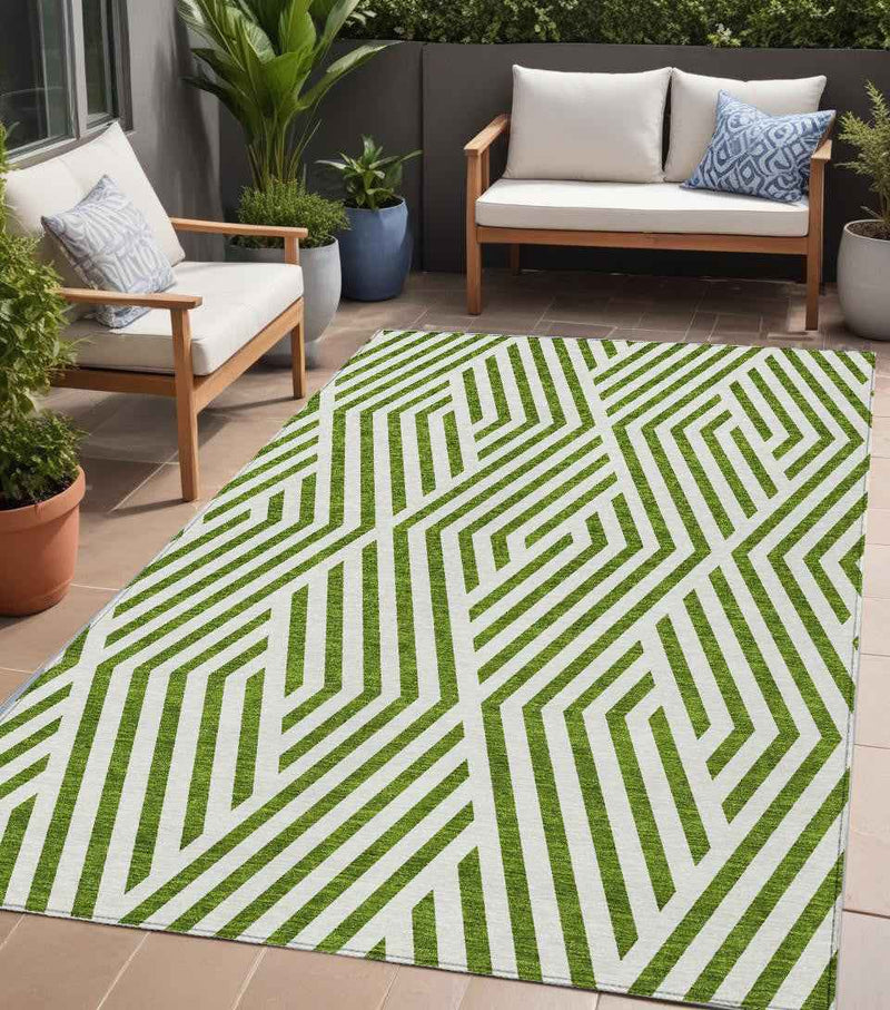 5' X 8' Lime Green and White Geometric Washable Non Skid Indoor Outdoor Area Rug