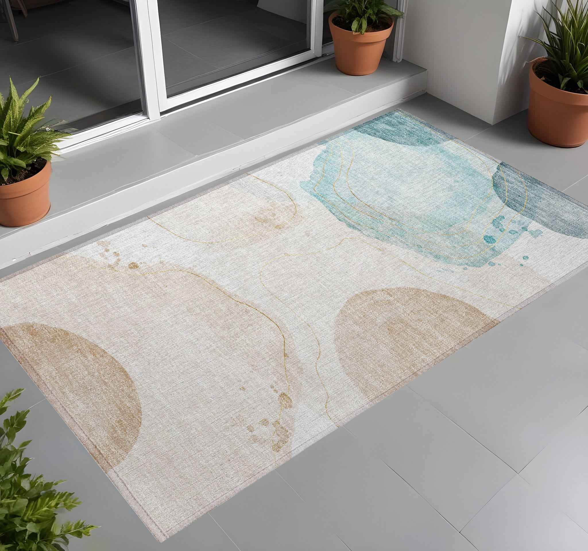 3' X 5' Beige and Blue Abstract Washable Non Skid Indoor Outdoor Area Rug