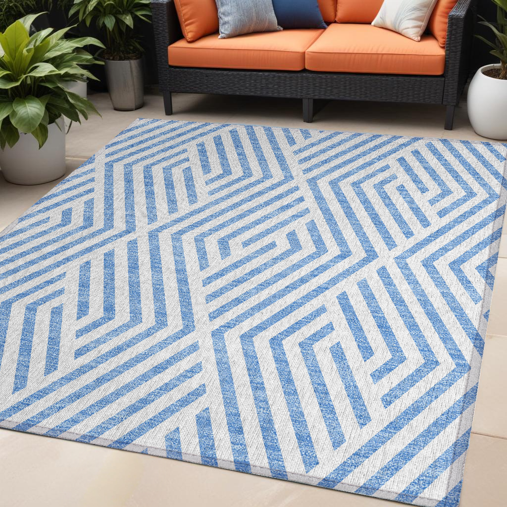 5' X 8' Blue And Ivory Geometric Washable Indoor Outdoor Area Rug