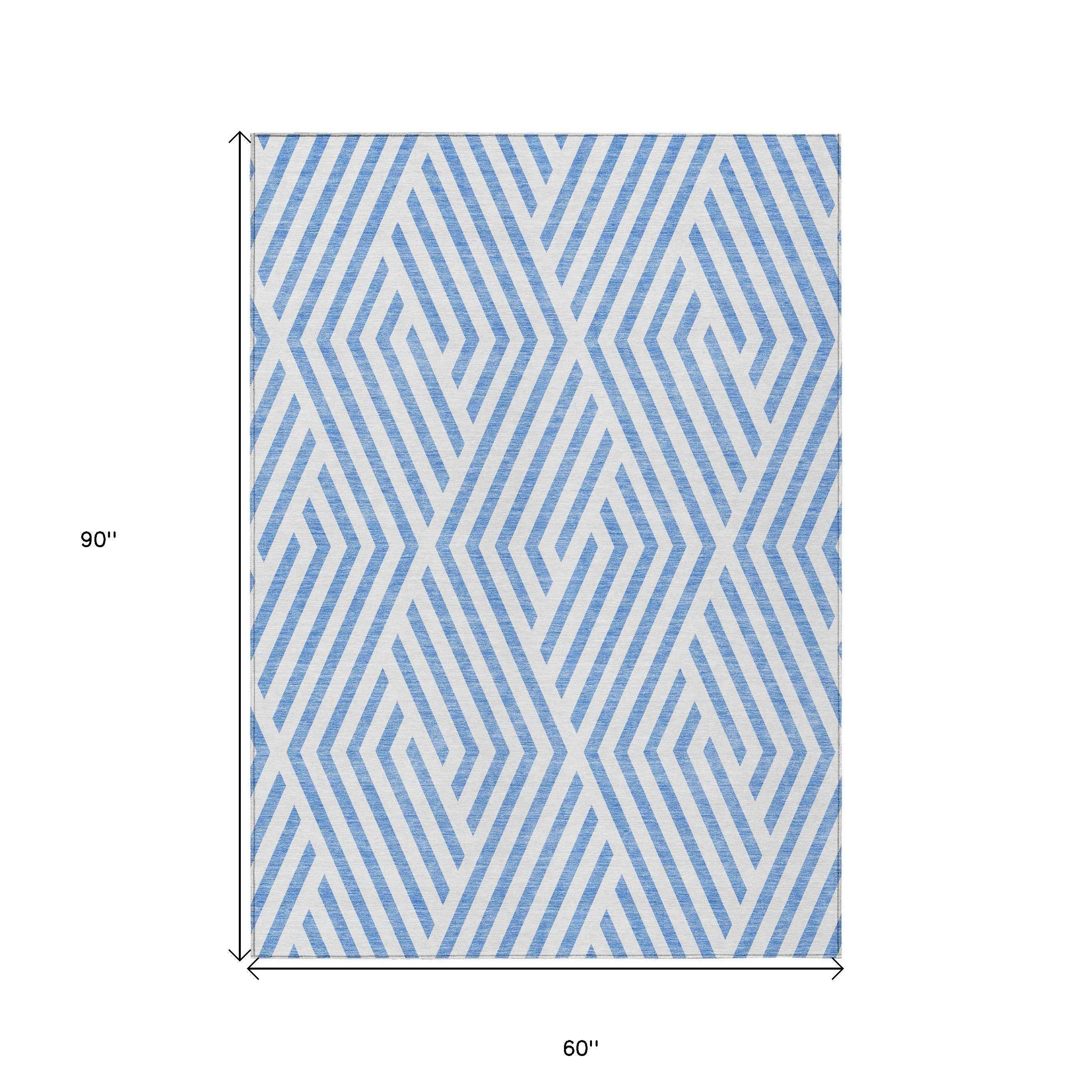 5' X 8' Blue And Ivory Geometric Washable Indoor Outdoor Area Rug