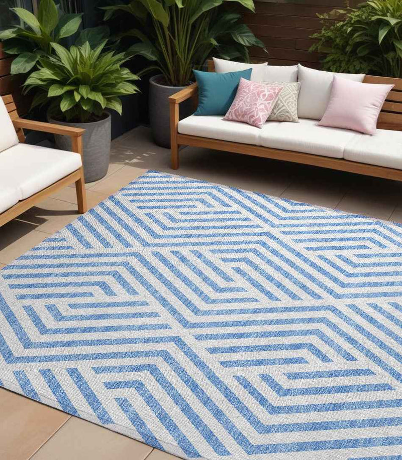 10' X 14' Blue And Ivory Geometric Washable Indoor Outdoor Area Rug