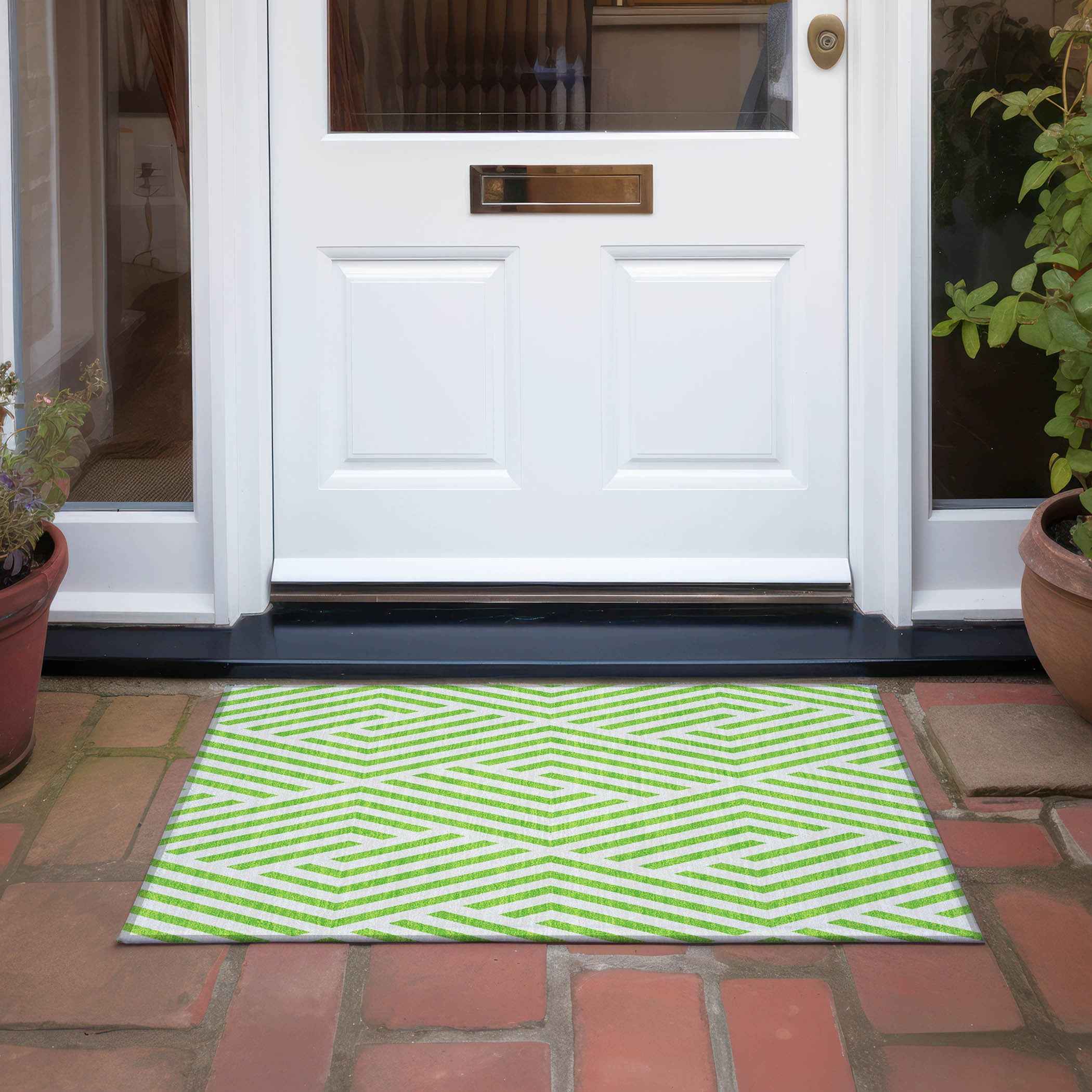 2' X 3' Lime Green and White Geometric Washable Non Skid Indoor Outdoor Area Rug