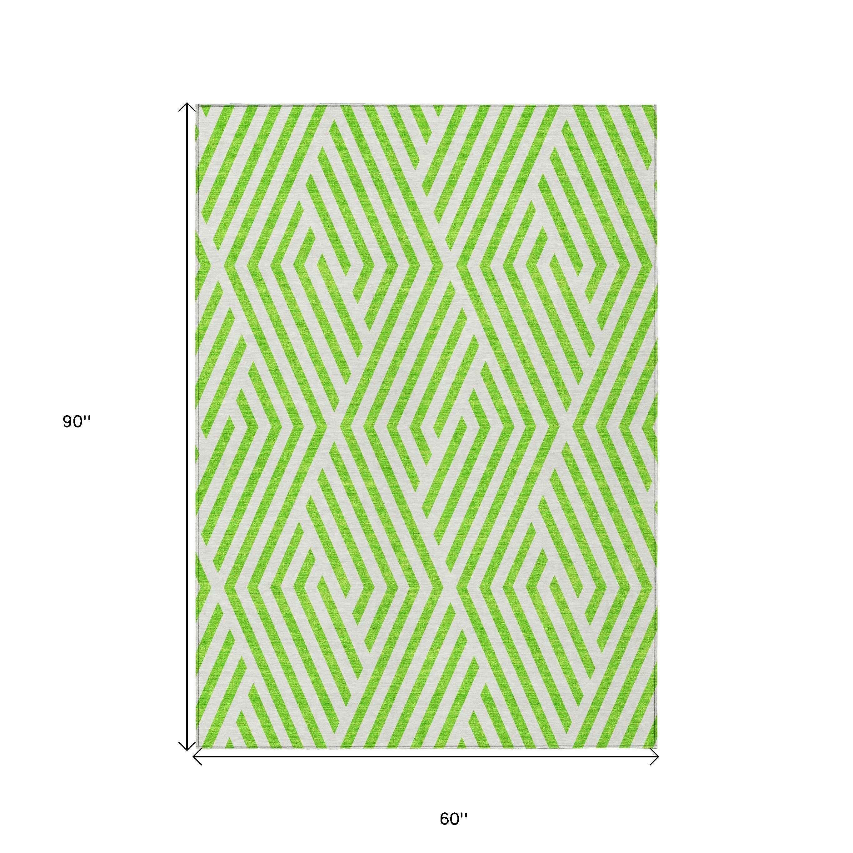 5' X 8' Lime Green and White Geometric Washable Non Skid Indoor Outdoor Area Rug