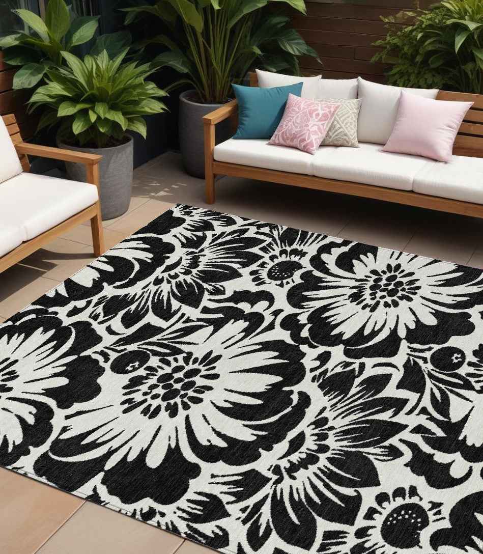 8' X 10' Black and Ivory Floral Washable Non Skid Indoor Outdoor Area Rug