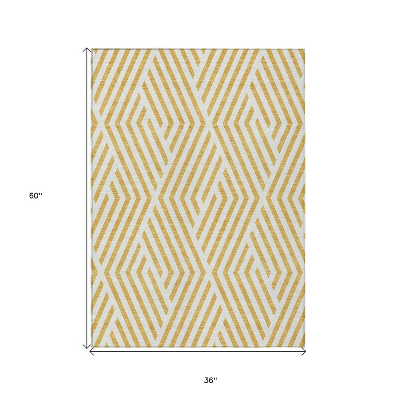 3' X 5' Gold and White Geometric Washable Non Skid Indoor Outdoor Area Rug