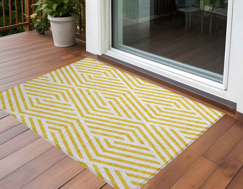 2' X 3' Gold and White Geometric Washable Non Skid Indoor Outdoor Area Rug