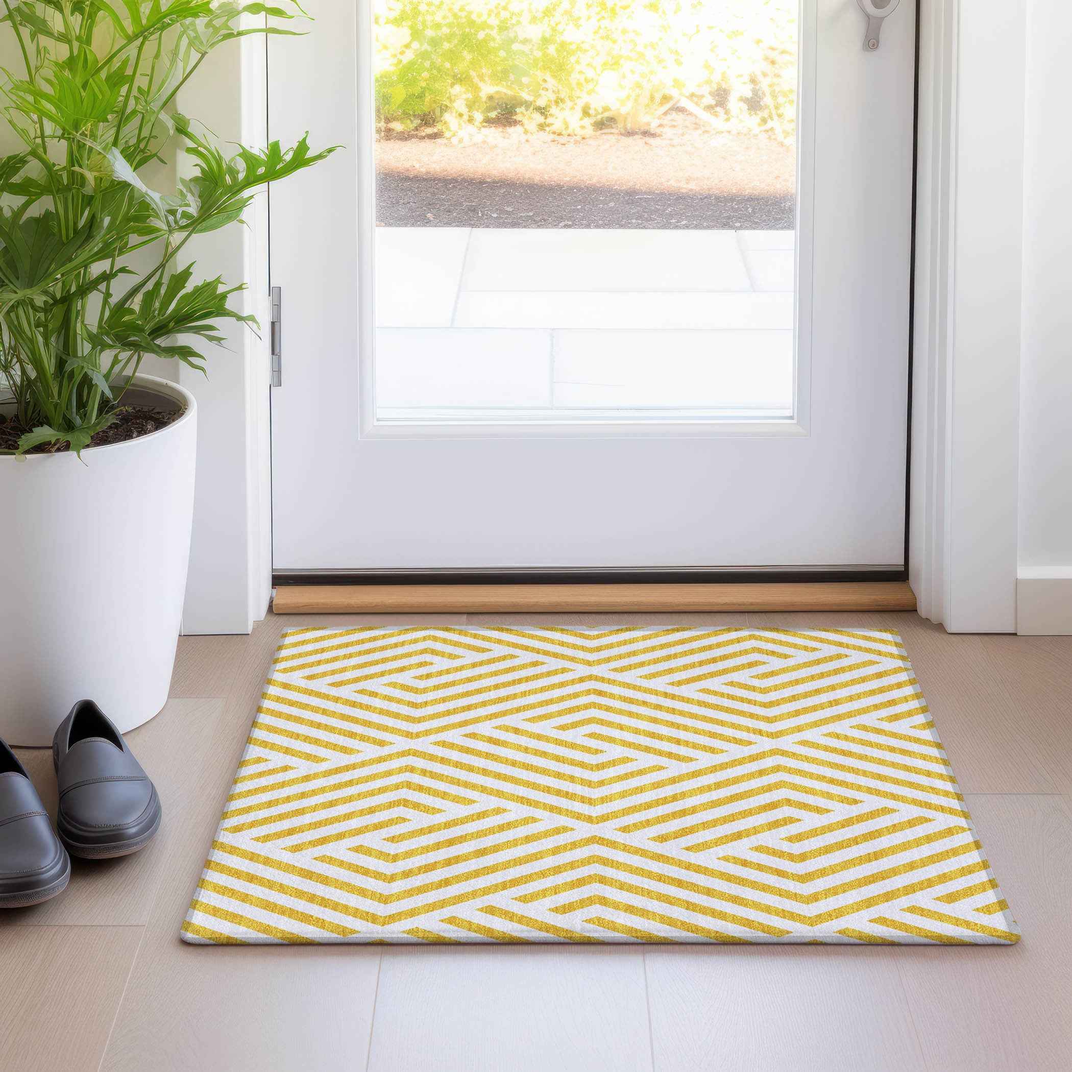 2' X 3' Gold and White Geometric Washable Non Skid Indoor Outdoor Area Rug