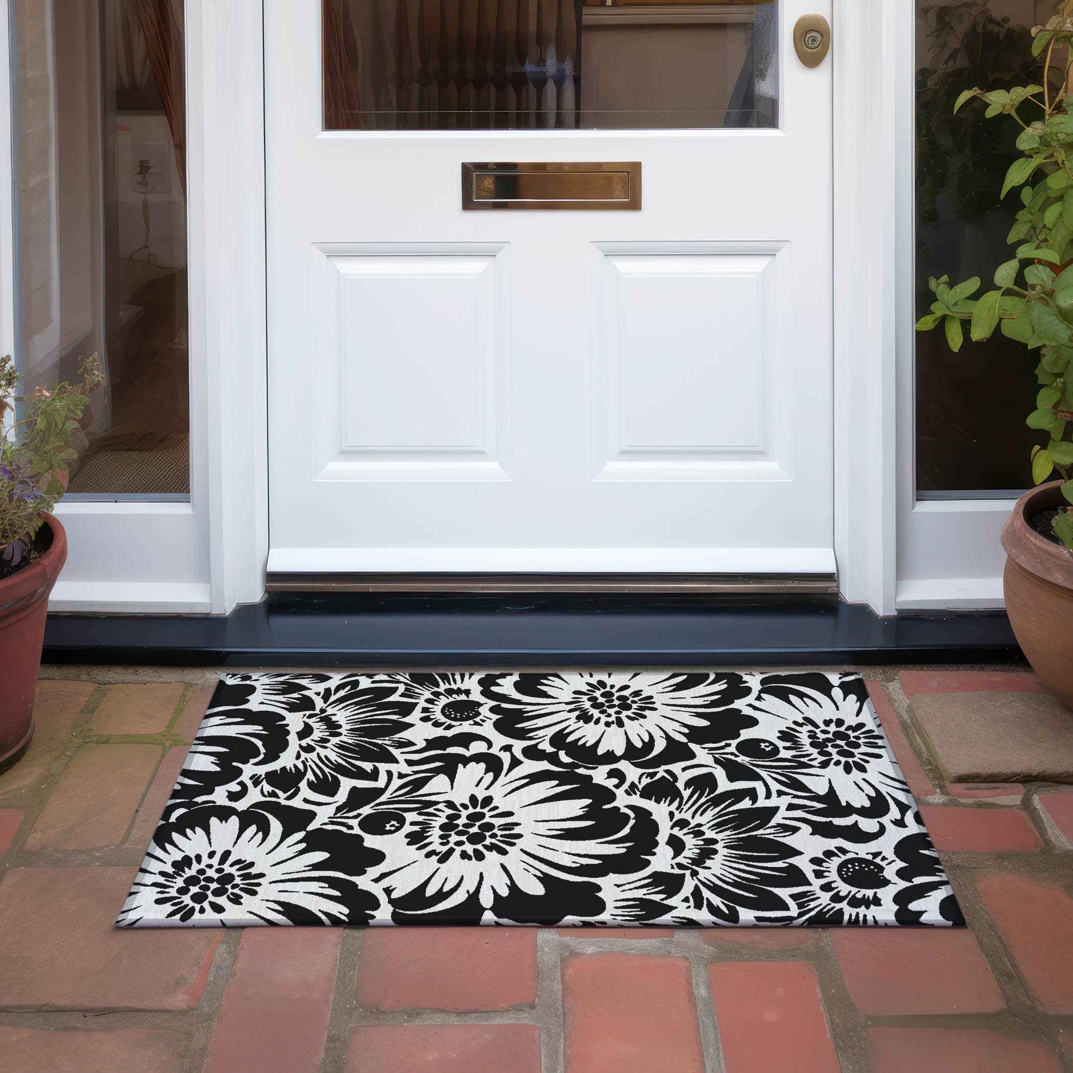2' X 3' Black and Ivory Floral Washable Non Skid Indoor Outdoor Area Rug