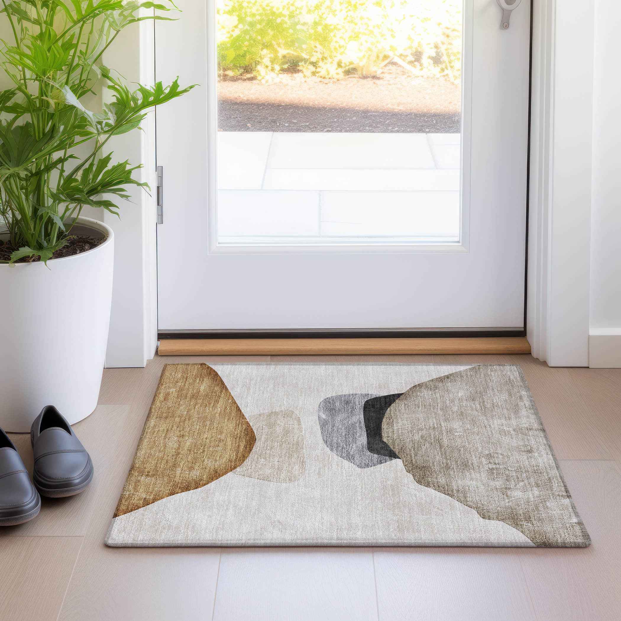 2' X 3' Tan Brown and Gray Abstract Washable Non Skid Indoor Outdoor Area Rug