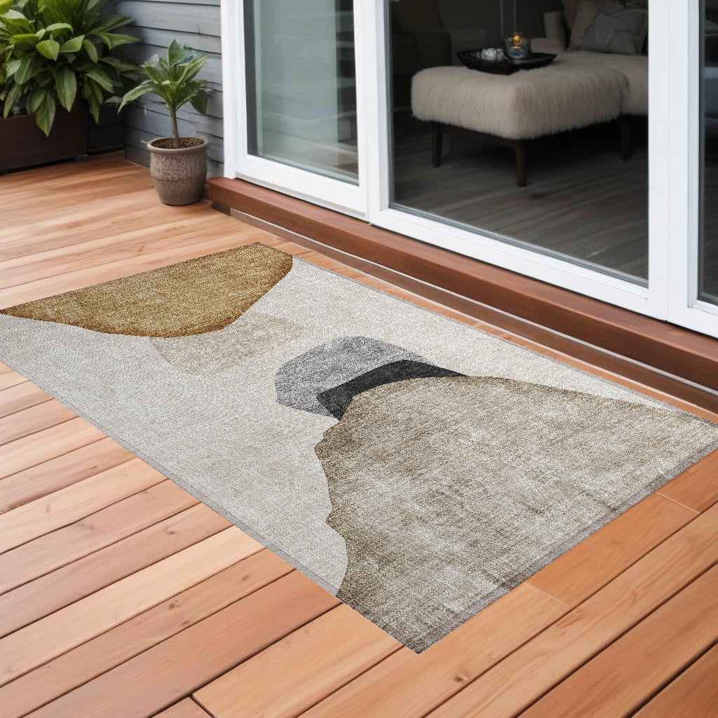 2' X 3' Tan Brown and Gray Abstract Washable Non Skid Indoor Outdoor Area Rug