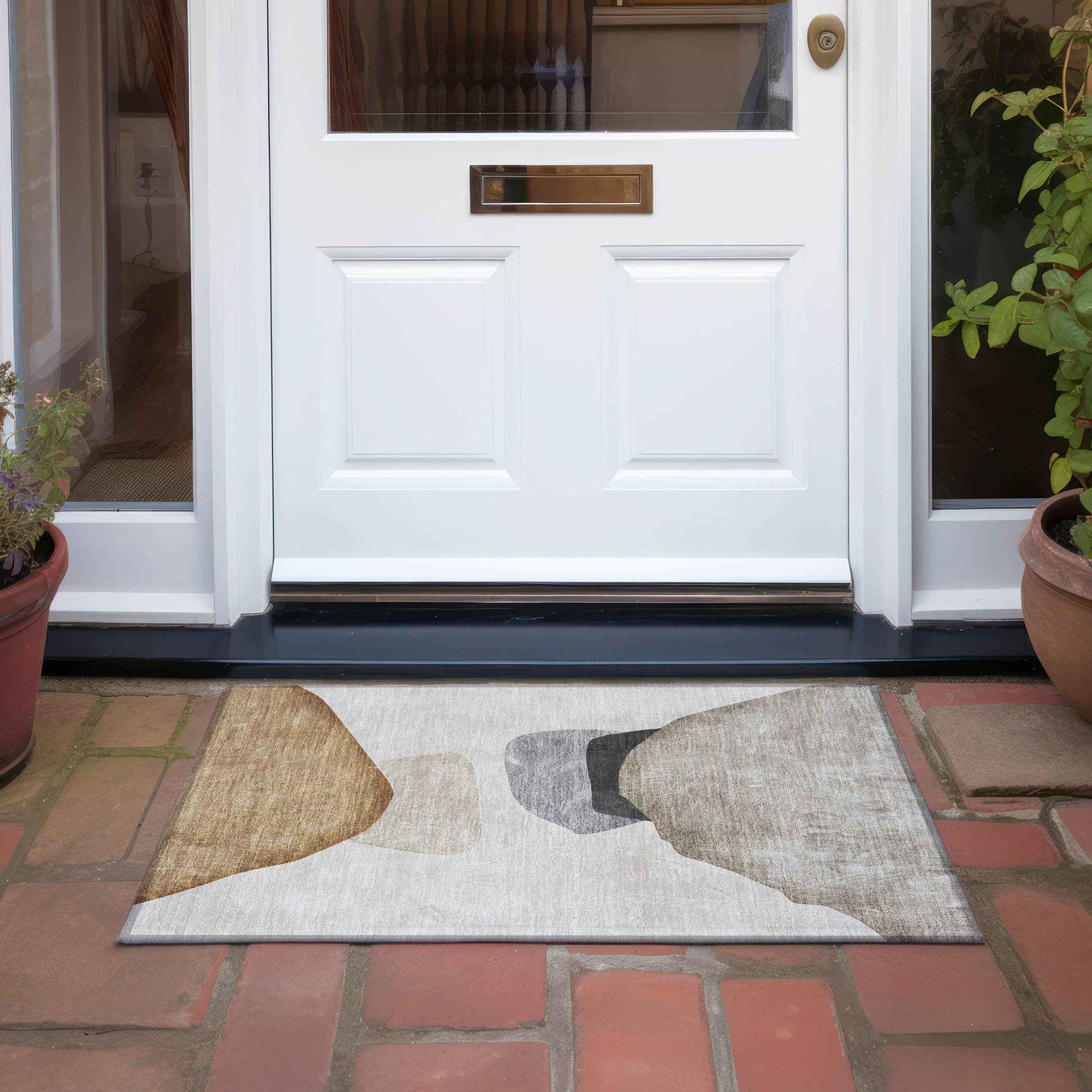 2' X 3' Tan Brown and Gray Abstract Washable Non Skid Indoor Outdoor Area Rug