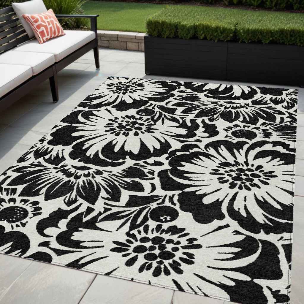 5' X 8' Black and Ivory Floral Washable Non Skid Indoor Outdoor Area Rug
