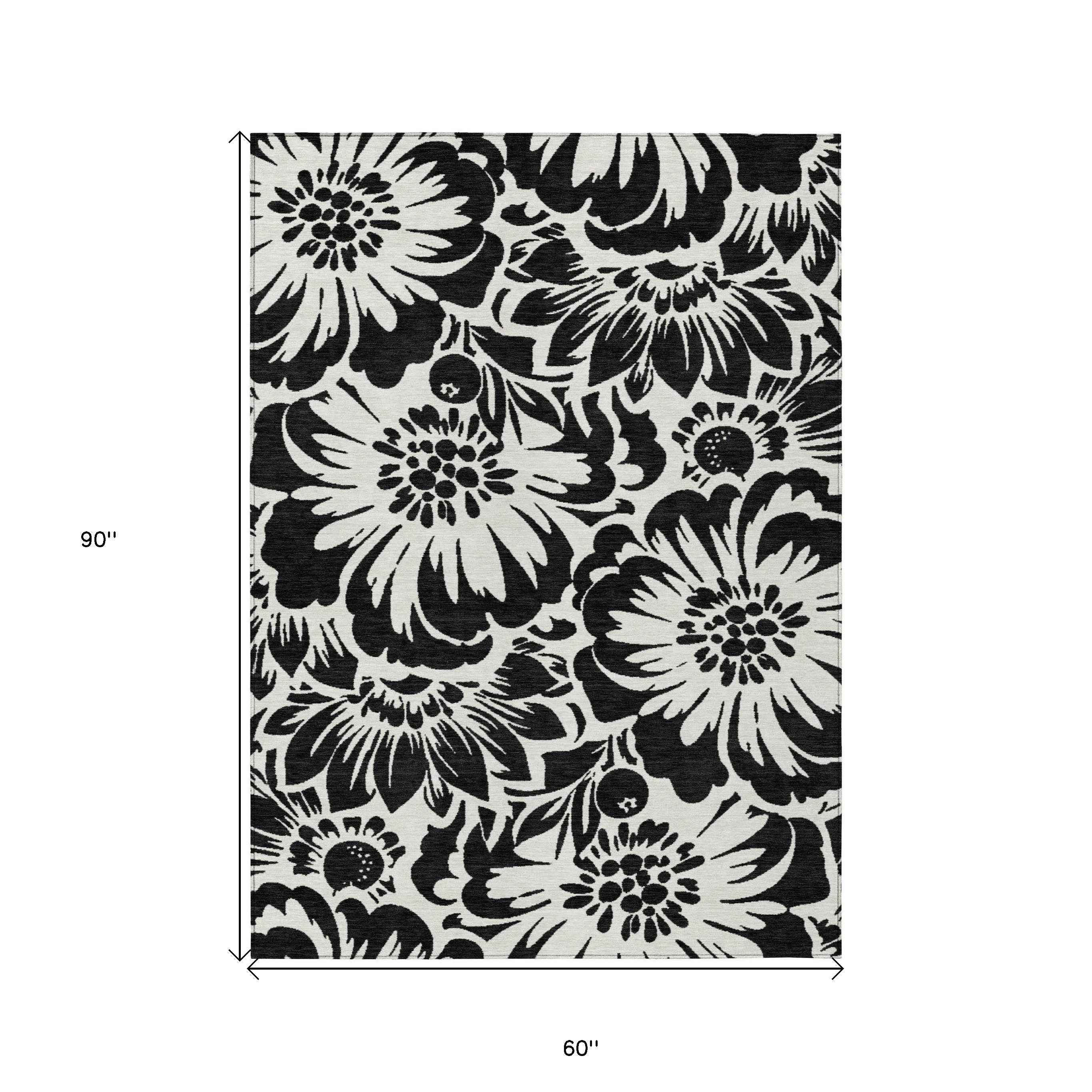 5' X 8' Black and Ivory Floral Washable Non Skid Indoor Outdoor Area Rug