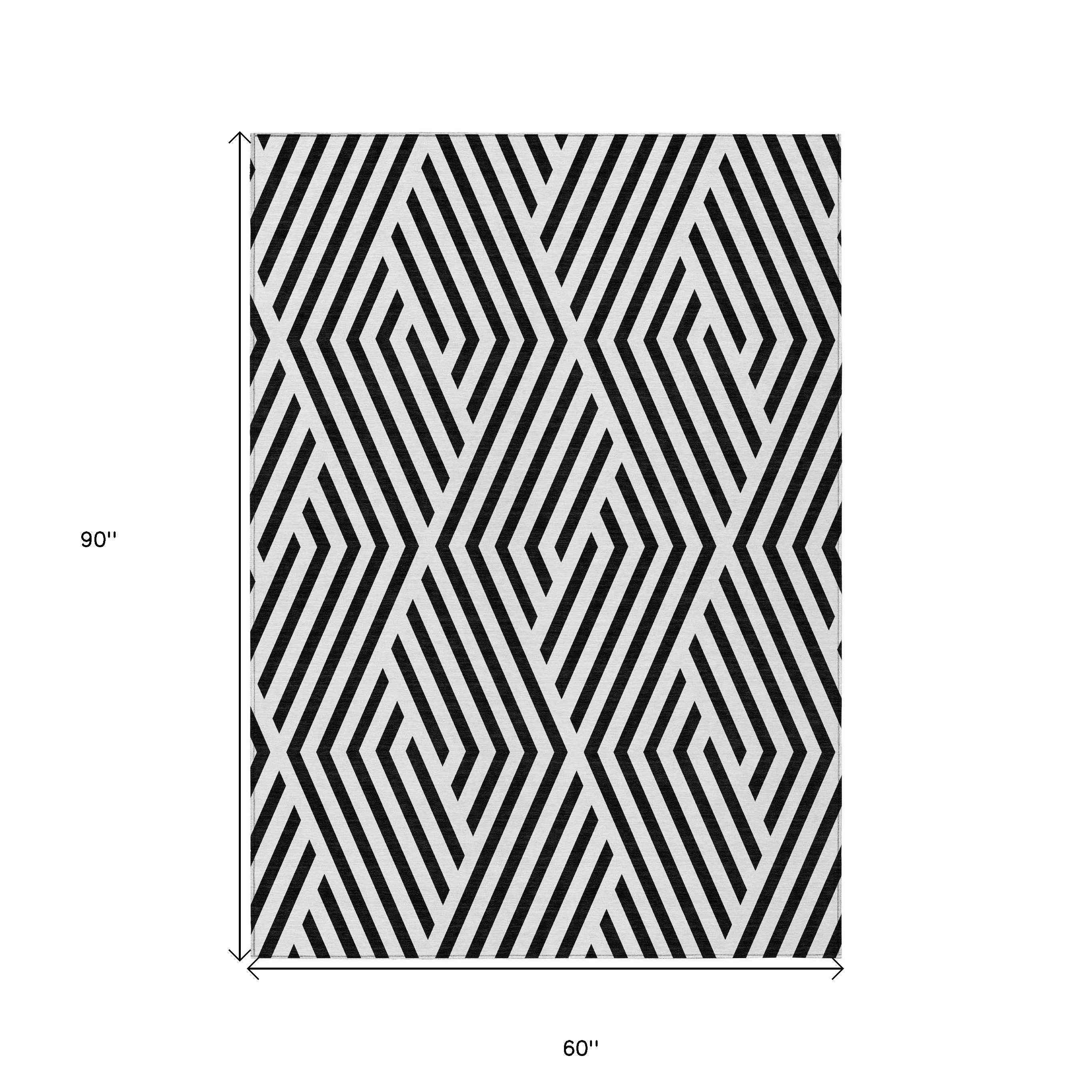5' X 8' Black and White Geometric Washable Non Skid Indoor Outdoor Area Rug