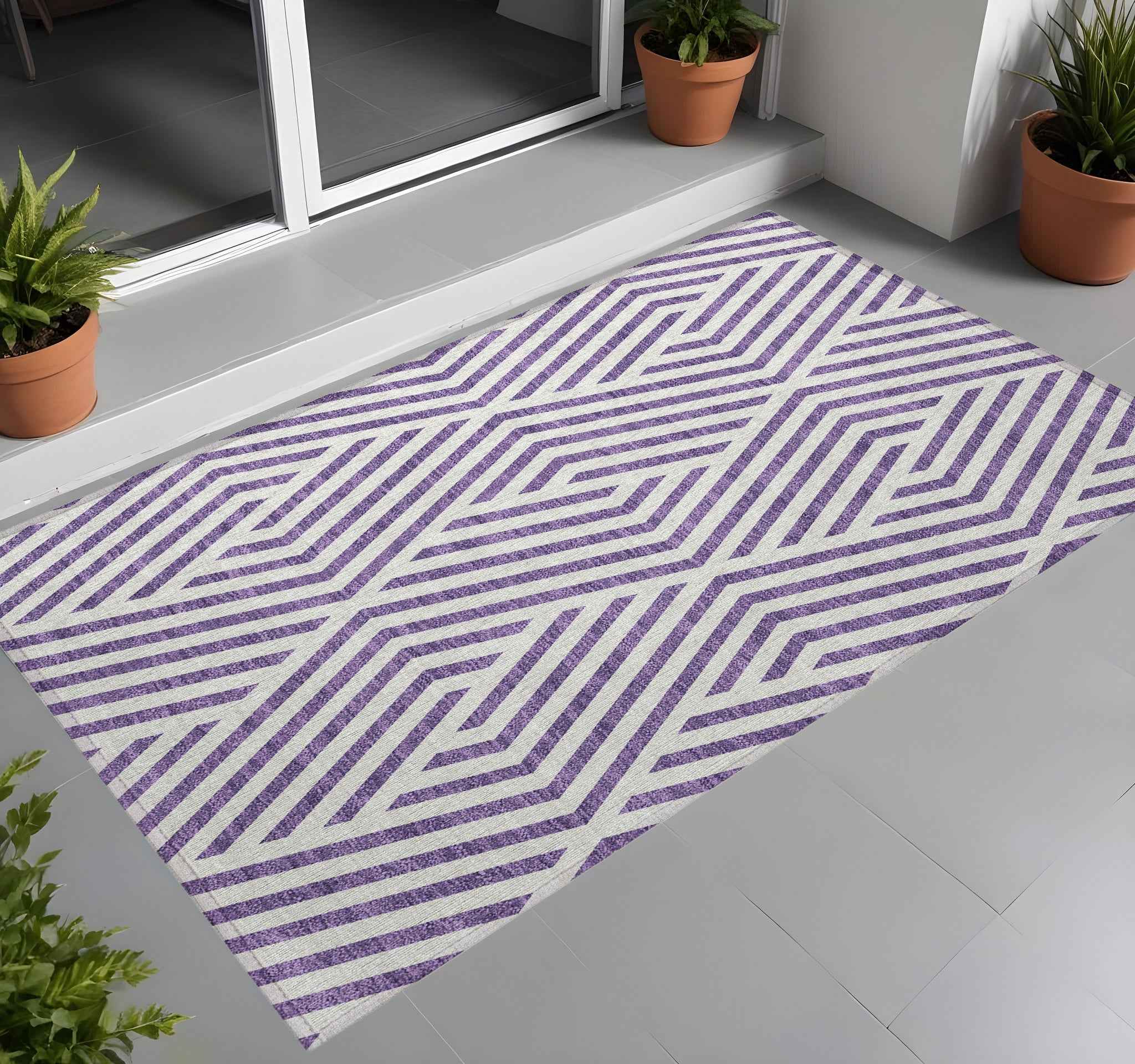 2' X 3' Purple and White Geometric Washable Non Skid Indoor Outdoor Area Rug