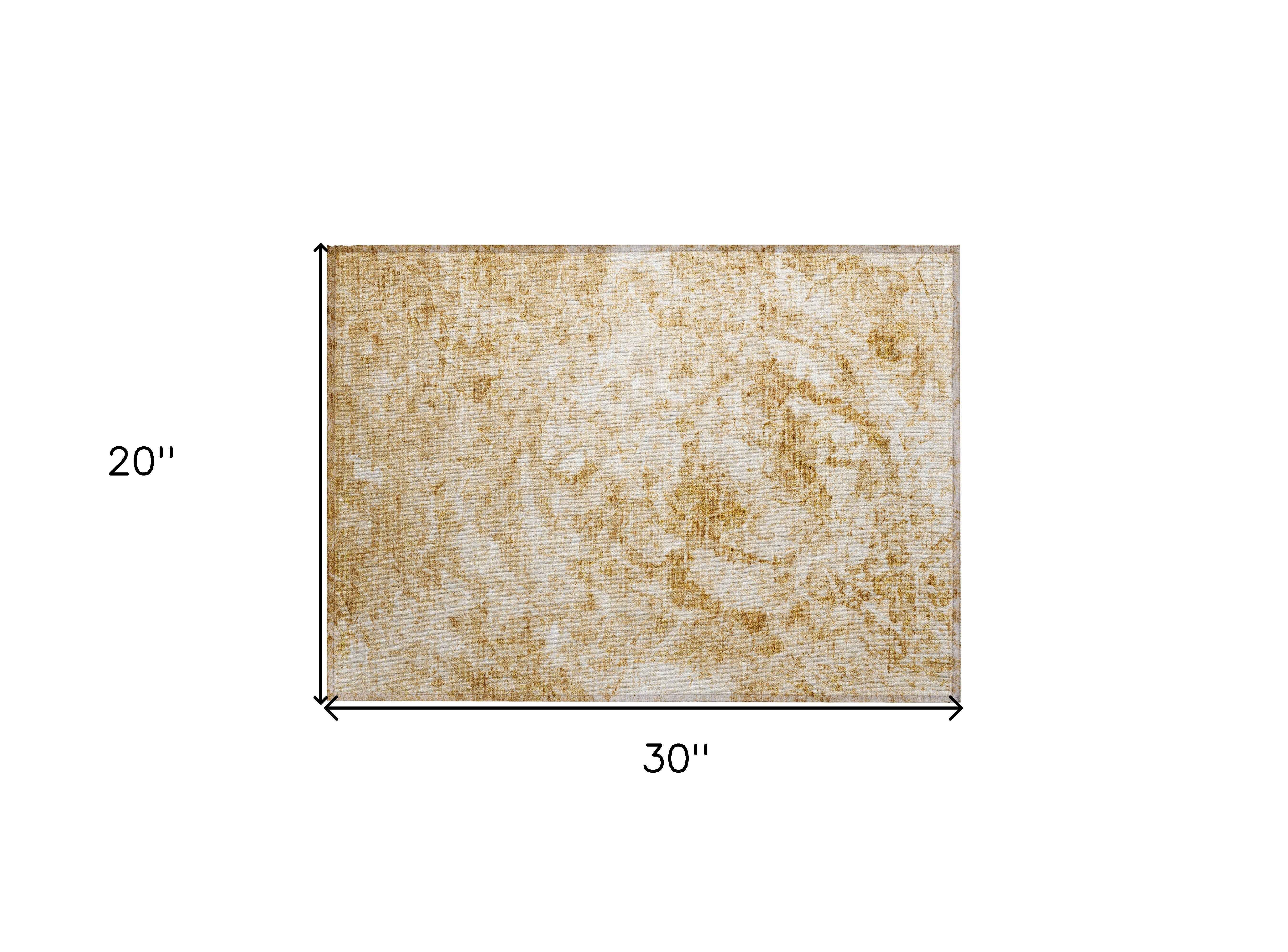 2' X 3' Cream and Gold Abstract Washable Non Skid Indoor Outdoor Area Rug