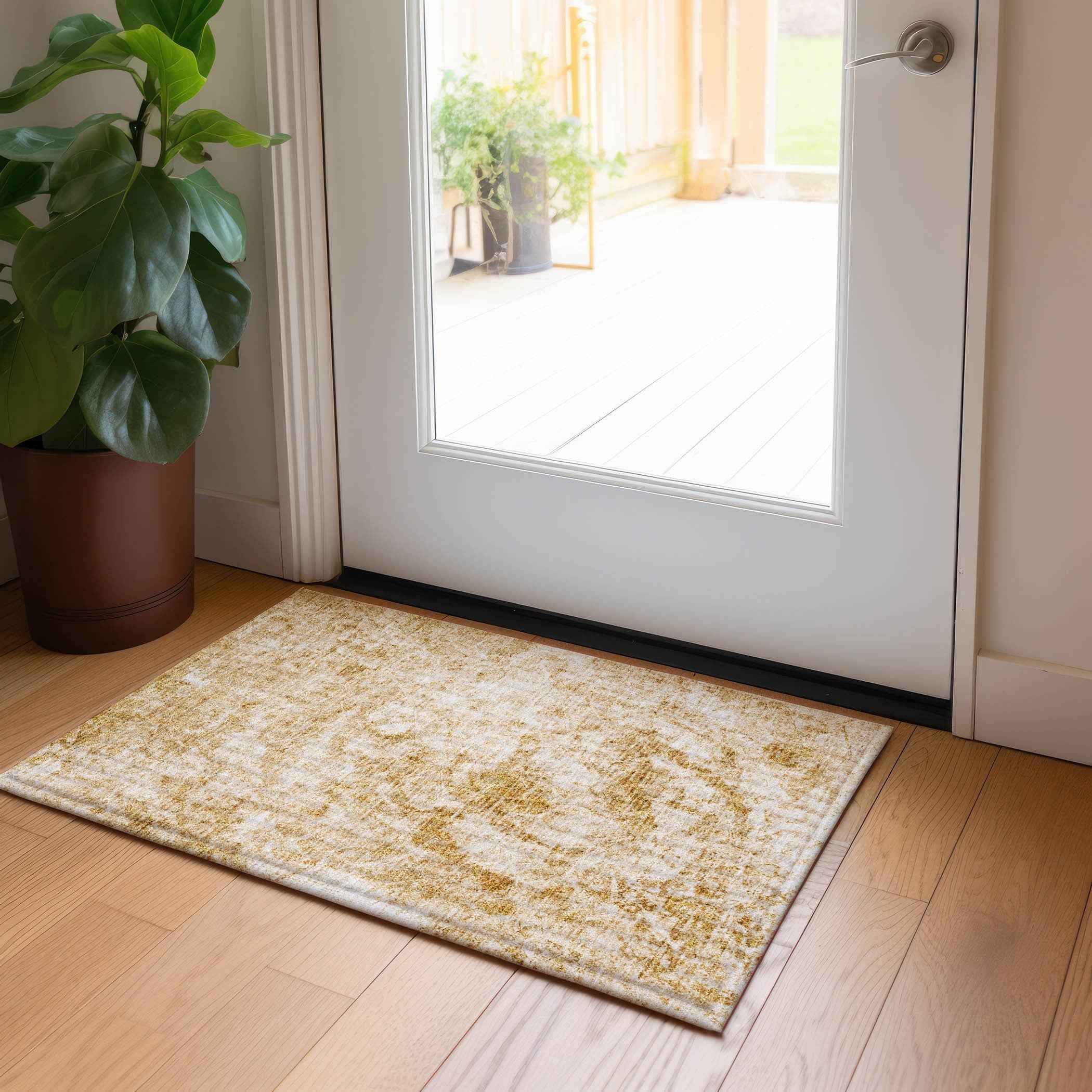 2' X 3' Cream and Gold Abstract Washable Non Skid Indoor Outdoor Area Rug