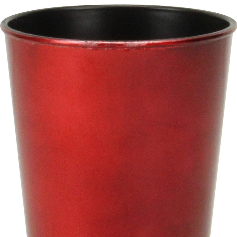 Close-up of red round plastic planter pot with black rim and interior