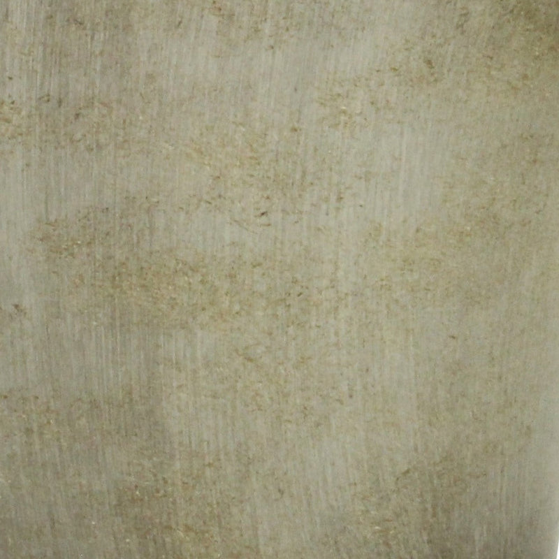 Gray planter with mottled stone-like texture on the surface close-up