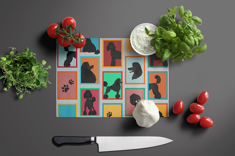 Cutting board with black poodle silhouette collage, paw-print icons, and a chef's knife.