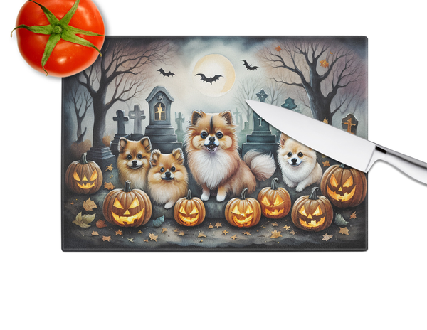 Glass cutting board with Pomeranian dogs, pumpkins, and graveyard spooky art