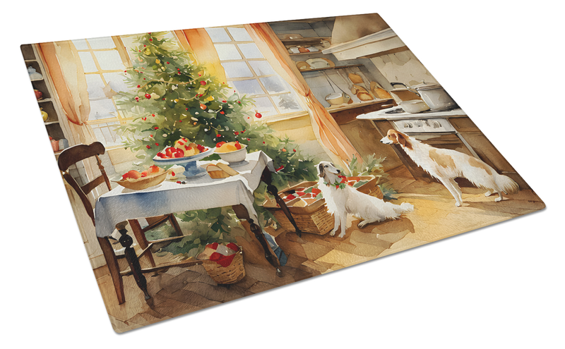 Glass cutting board with angled view of holiday house cookie scene and dogs