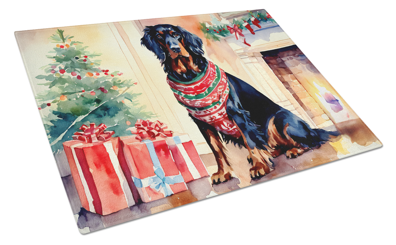 Glass cutting board featuring a Gordon setter with red scarf and Christmas presents, angled view