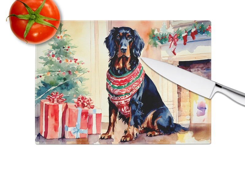 Glass cutting board with Gordon setter artwork and Christmas gift boxes, corner edge with knife