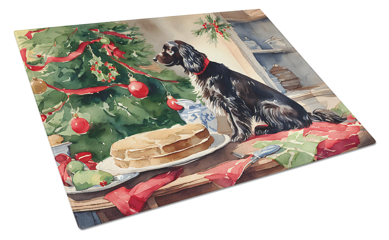 Angled glass cutting board featuring Boykin Spaniel, Christmas decor, and cookies