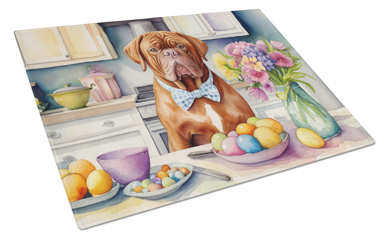 Glass cutting board featuring Dogue de Bordeaux in bowtie with Easter eggs on countertop