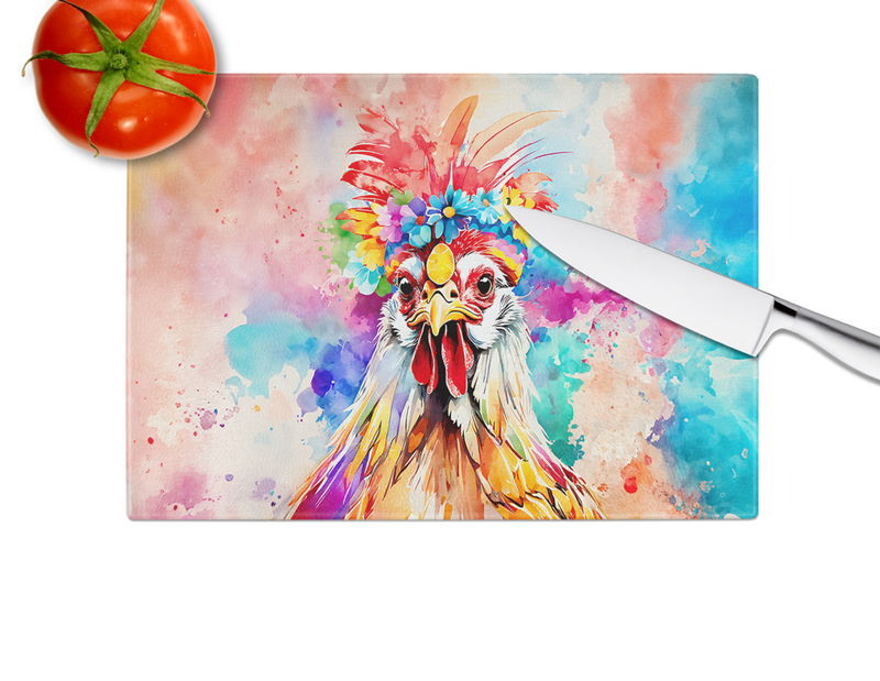 Rooster graphic glass cutting board with white chef knife angled on top
