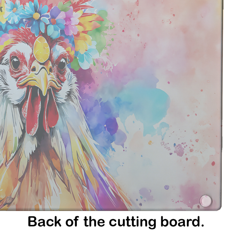 Close-up of rooster artwork on a glass cutting board