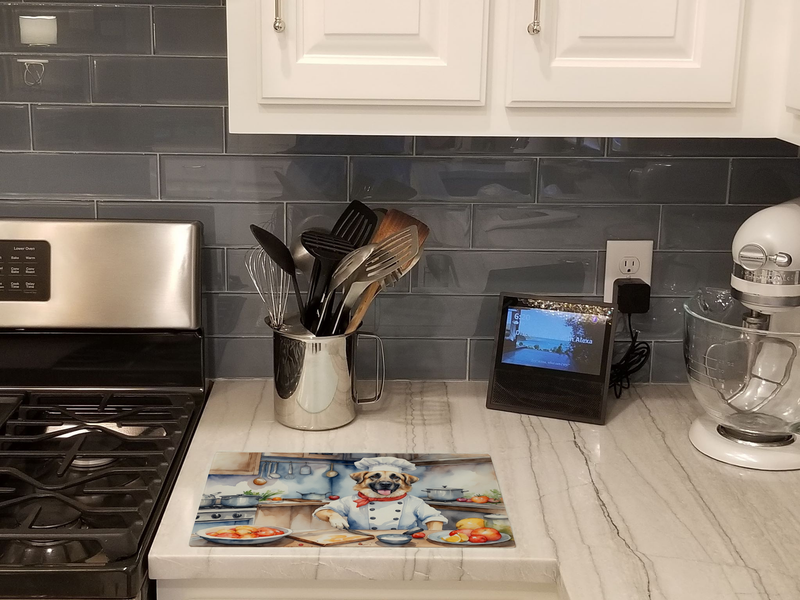 Glass cutting board with chef dog kitchen illustration, placed on kitchen counter
